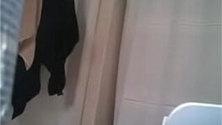 Hidden cam in bathroom of a college girl - porn video