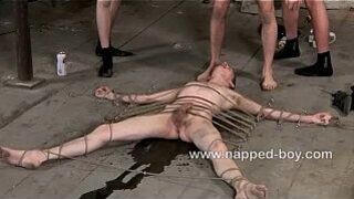 Hot Ashton Bradley is roped to the floor and used by three guys - porn video