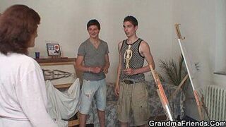 Naughty granny takes two young dicks - porn video