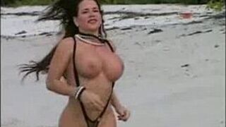 Big breasts babe on the beach - porn video