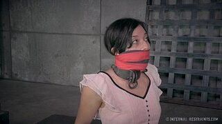Petite Brunette in Metal Bondage - porn video